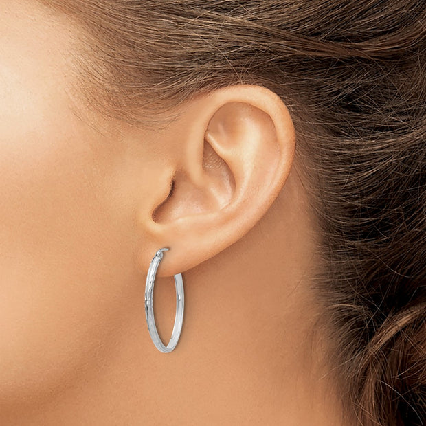 14k White Gold Lightweight Diamond-cut Oval Hoop Earrings